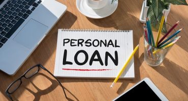 Personal,Loan,Open,Book,On,Table,And,Coffee,Business
